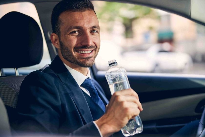 Drinking water in car